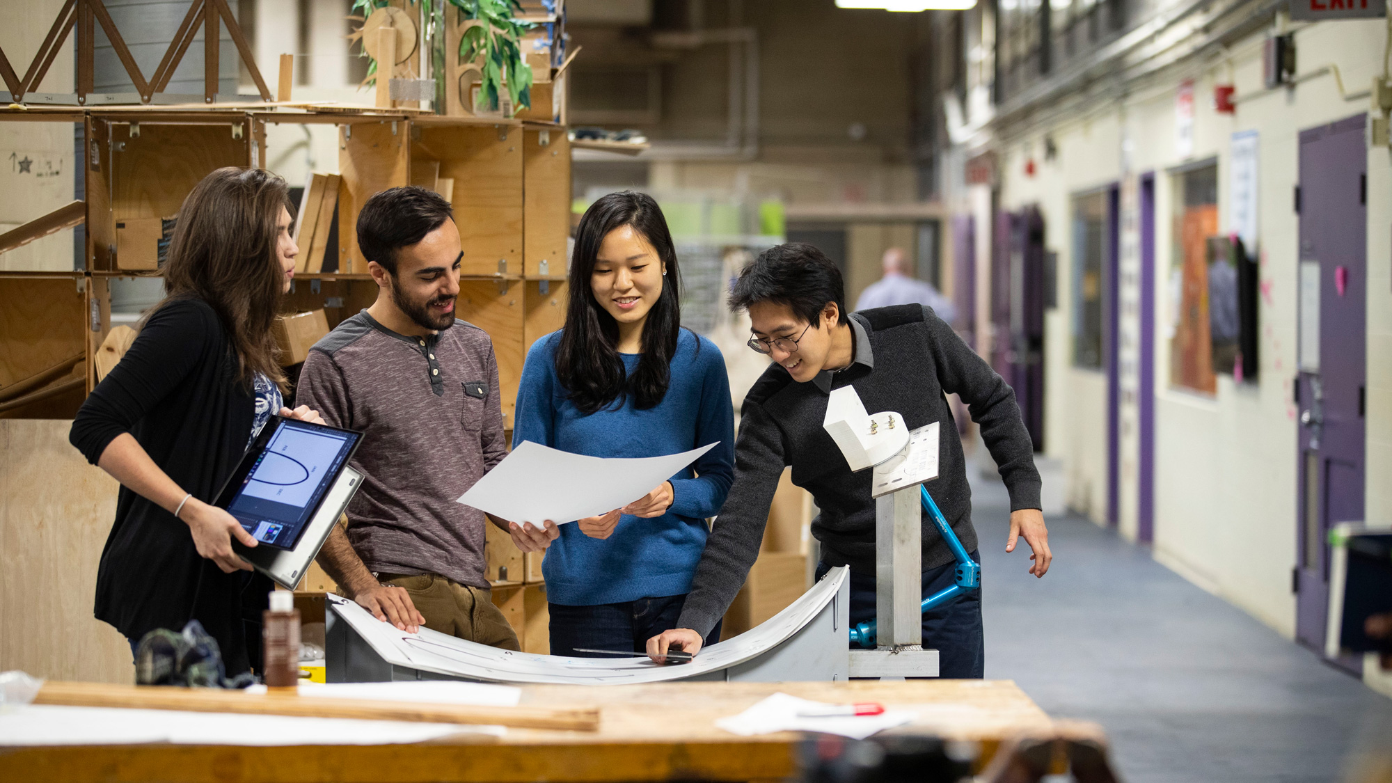 Educators and students discussing Open Curriculum in a classroom setting