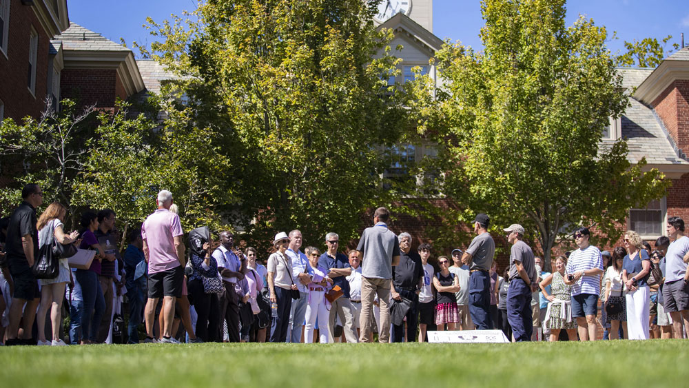 A group of students visiting Brown University campus
