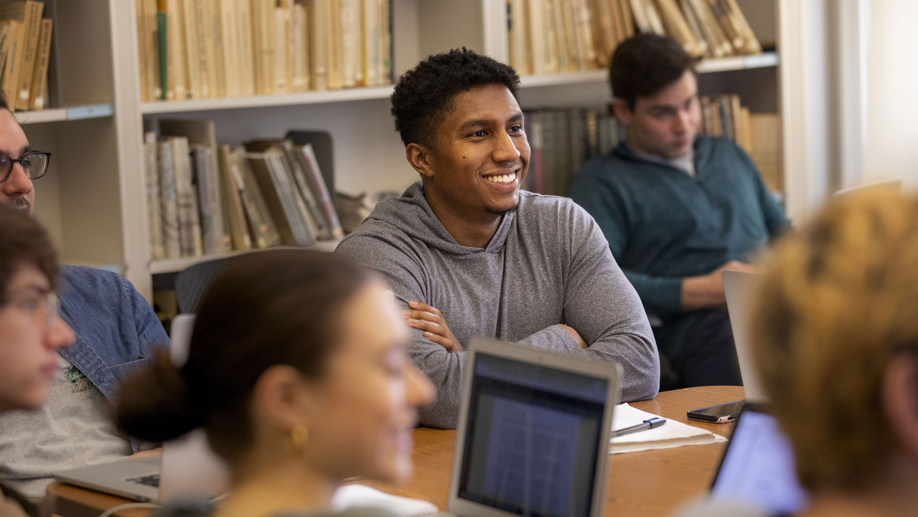 Brown University student happily engaged in a classroom